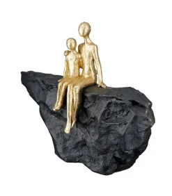 Skulptur: En mors kærlighed, Guld og sort